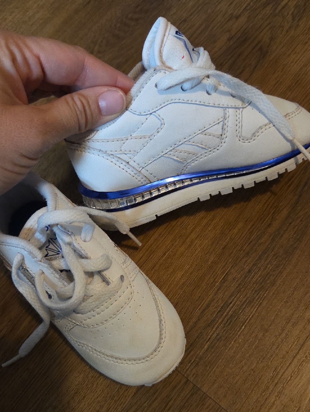 Reebok White Kids Sneakers with Blue Metallic Trim